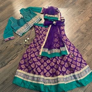 Medium green and purple lengha choli. Only worn once.